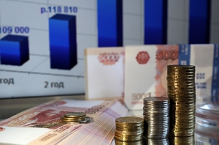 Курс рубля вырос вопреки валютным закупкам Минфина